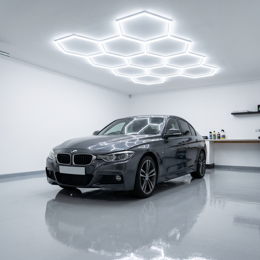 11 hexagon LED kit lit above a car in a garage