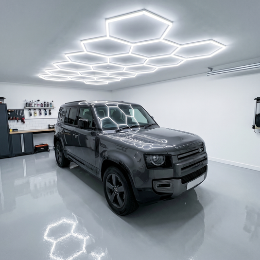 17 hexagon LED light kit lit above a car in a garage