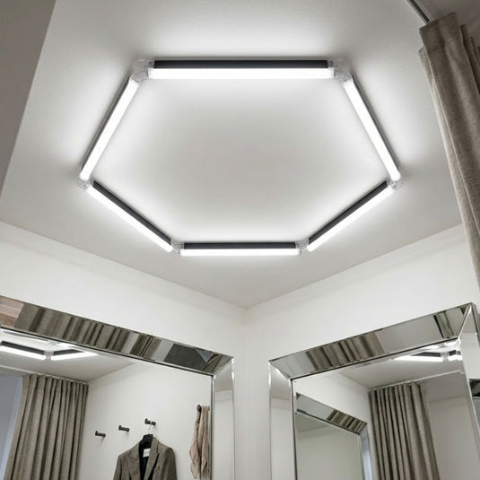Single hexagon LED light in a dressing room ceiling