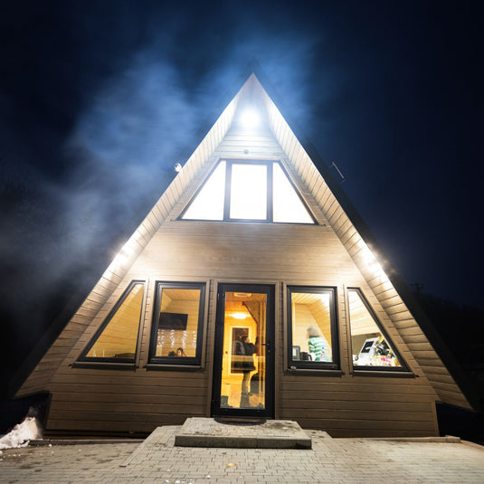Floodlights lighting a house at night