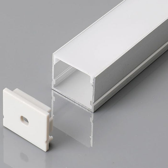 Silver LED profile with a milky diffuser and white end cap