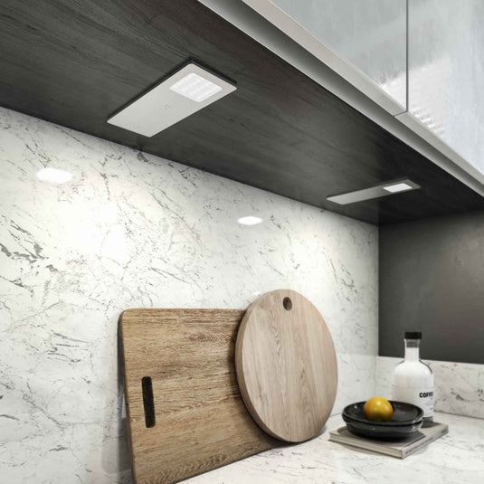 Cheeseboard on a worktop lit by a Recti cabinet light