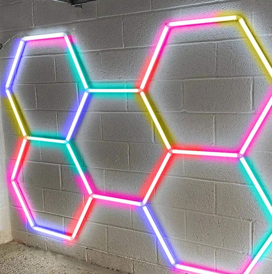 RGB hexagon LED tubes fitted on a wall