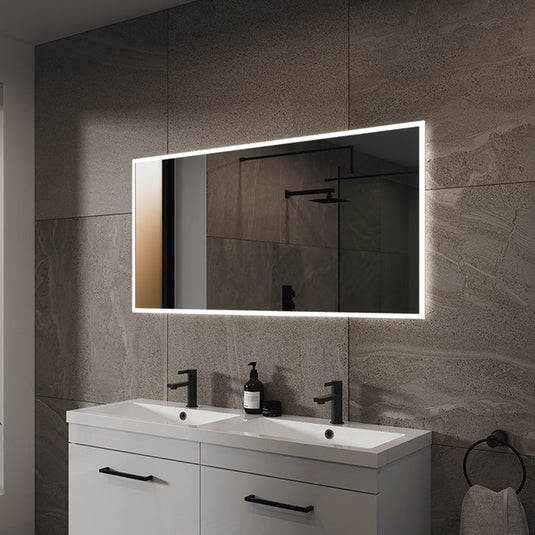 Glimmer Pro LED mirror lit above a double basin