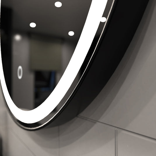 Aurora, Round LED Bathroom Mirror, 610mm - Matte Black close up shot, in natural white light