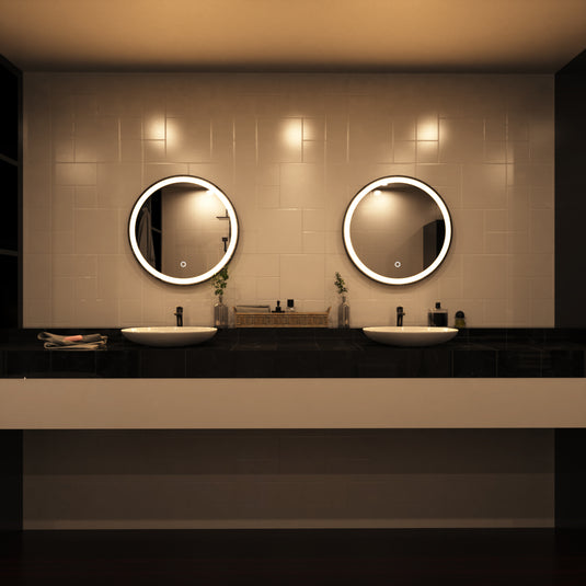 Aurora, Round LED Bathroom Mirror, 610mm - Matte Black front facing shot above sink, loo setting, in warm white light