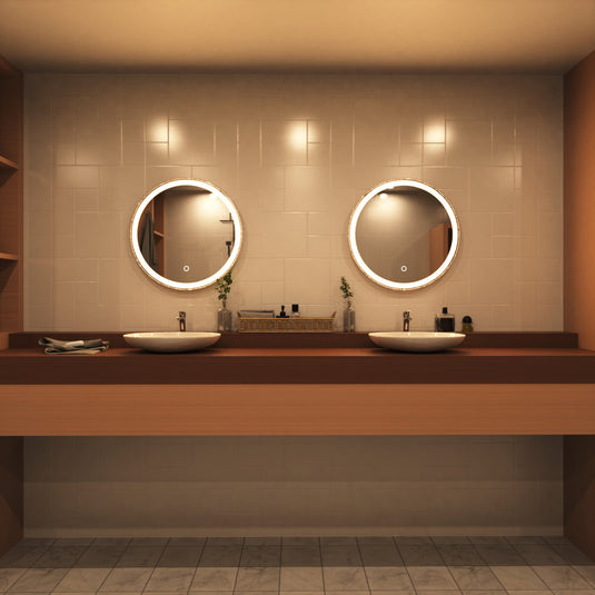 Rose Gold bezel Bathroom LED above the sinks setting in warm white light