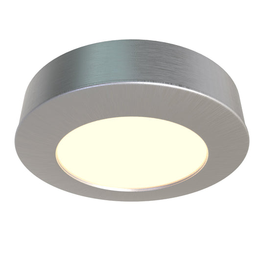Brushed chrome under cabinet light with a warm glow