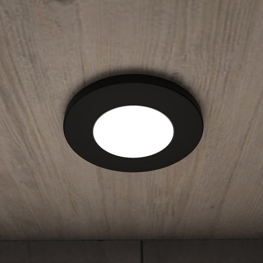 Close up of a cabinet light under a kitchen cabinet