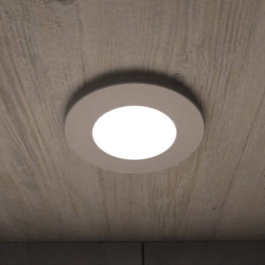 Close up of a cabinet light under a kitchen cabinet
