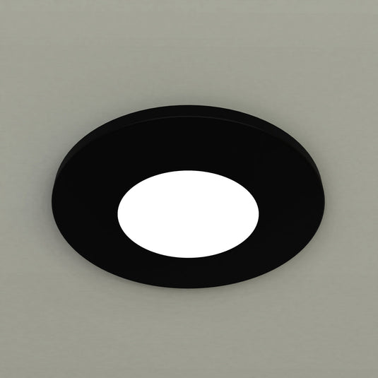 Close up of a fitted matt black downlight