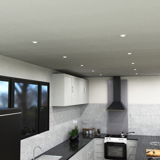 Kitchen lit by white GU10 downlights
