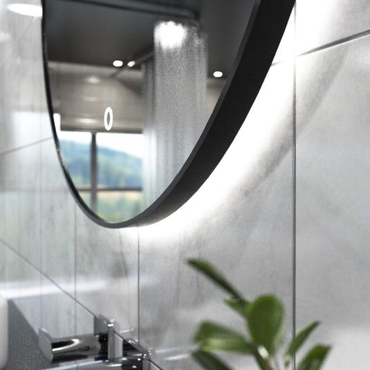 Luxe, 600mm LED Bathroom Mirror - Brushed Black close up shot on the frame, in natural white light
