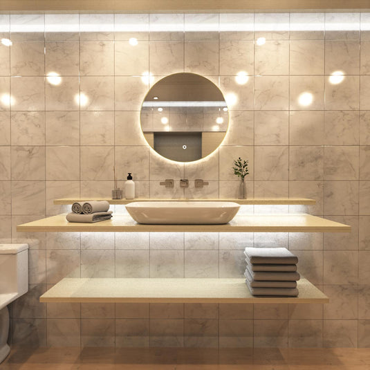 Luxe, 600mm LED Bathroom Mirror - Brushed Titanium Gold above the sink in warm white light