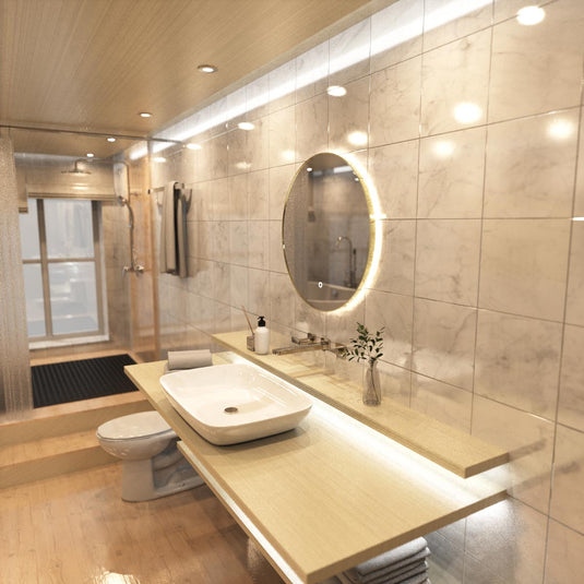 Luxe, 600mm LED Bathroom Mirror - Brushed Titanium Gold above the sink in warm white light side shot close up