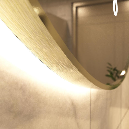 Luxe, 600mm LED Bathroom Mirror - Brushed Titanium Gold close up shot on the frame, in warm white light
