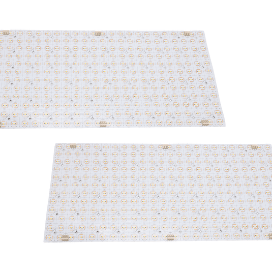 Two LED sheets laid out on a white surface