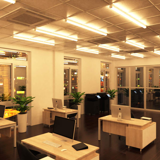 Office lit in warm white by LED battens