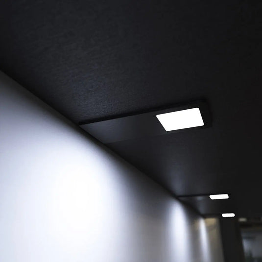 Black Recti Superslim 5w LED Cabinet Light, mounted under cabinet in cool white light side shot