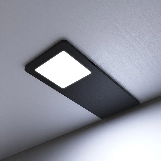 Black Recti Superslim 5w LED Cabinet Light, mounted under cabinet in cool white light