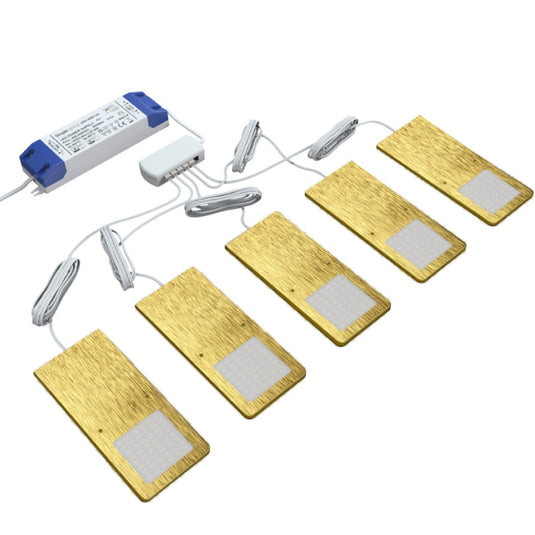 Five brushed brass cabinet lights connected to one LED driver