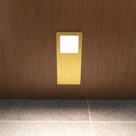 Natural white brushed brass cabinet light, close view