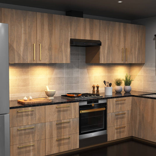 Kitchen worktop lit by warm white slim cabinet lights