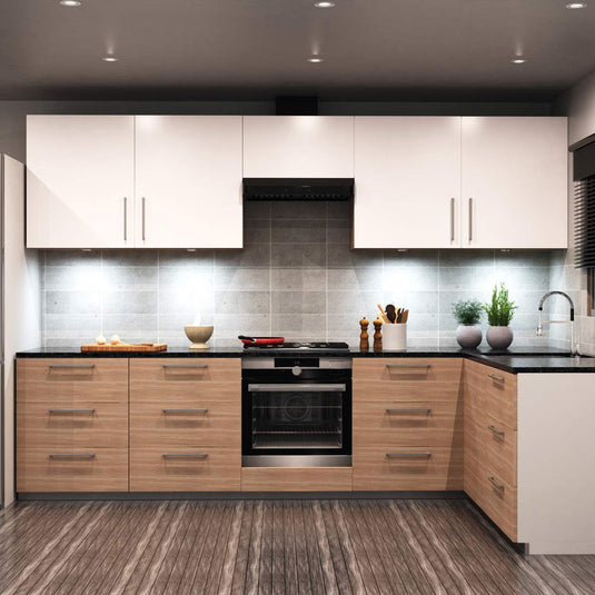 Kitchen lit by cool white cabinet lights