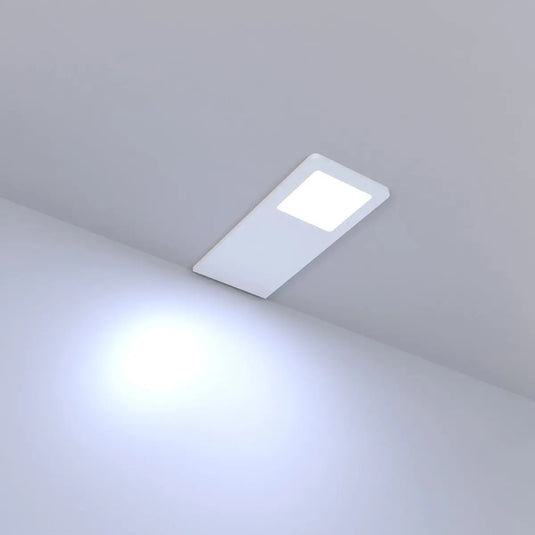 Recti Superslim 5w LED Cabinet Light, Matte White, in cool white light lit, sideways angle