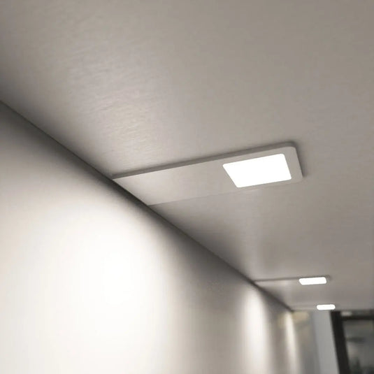 Recti Superslim 5w LED Cabinet Light, Matte White, mounted under cabinet in natural white light side shot