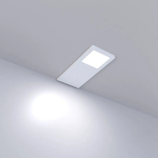 Recti Superslim 5w LED Cabinet Light, Matte White, in natural white light lit, sideways angle
