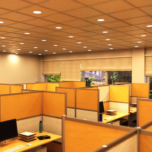 Office lit by warm white round LED panels