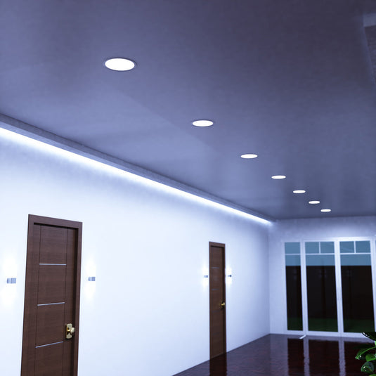 Hallway ceiling with cool white round panels