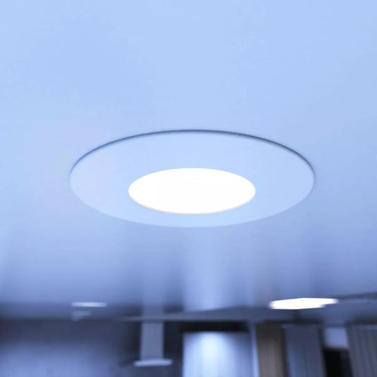 Fire Rated Downlights, White in cool white light mounted in ceiling