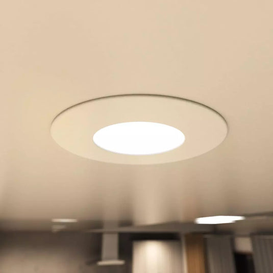 Fire Rated Downlights, White in natural white light mounted in ceiling