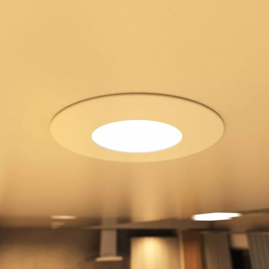 Fire Rated Downlights, White in warm white light mounted in ceiling