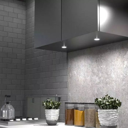 Mid close up of a mounted recessed type led cabinet light with cool white lights