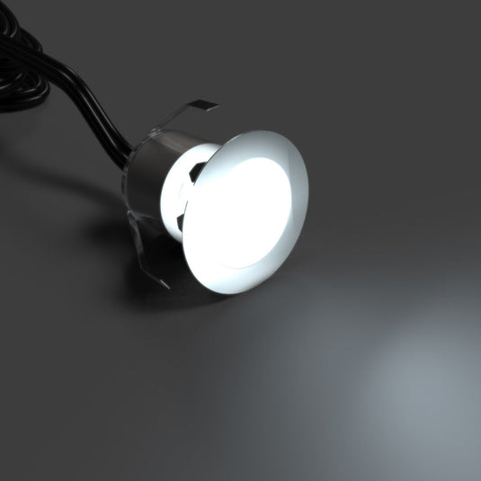 Close up of a lit 30mm decking light