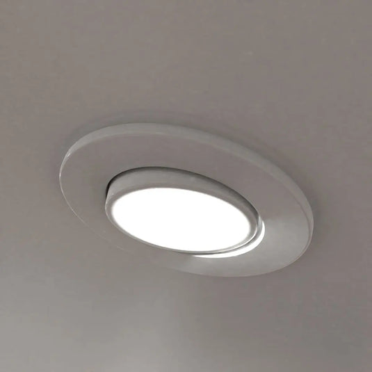 Tilt GU10 Fire Rated Downlights with a White Finish mounted in ceiling