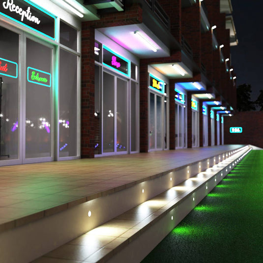 Stairs lit by cool white decking lights, full view