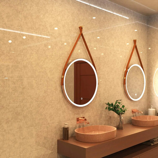 Gleam Hanging LED Bathroom Mirror - 600mm - Brushed Rose Gold in warm white light, mounted above the sinks