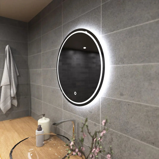 Glow, 600mm LED Bathroom Mirror mounted on the wall in cool white
