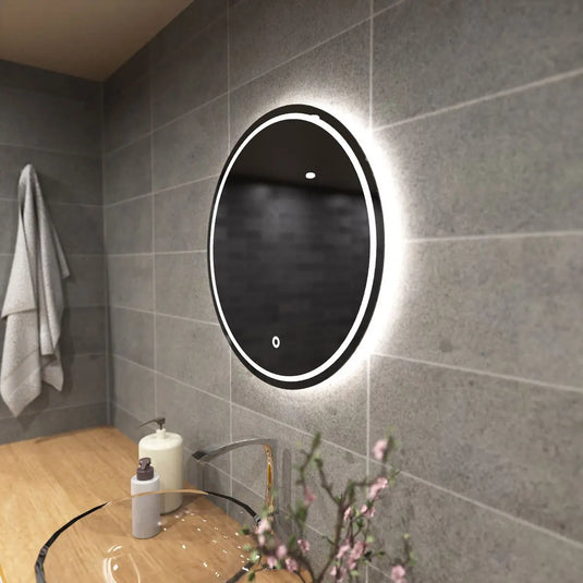 Glow, 600mm LED Bathroom Mirror mounted on the wall in natural white