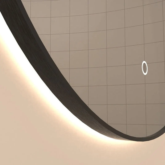 Luxe, 600mm LED Bathroom Mirror - Brushed Black close up shot on the frame, in natural white light