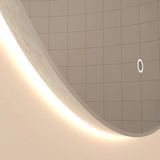 Luxe, 600mm LED Bathroom Mirror - Brushed Silver close up shot on frame, backlit with warm white light