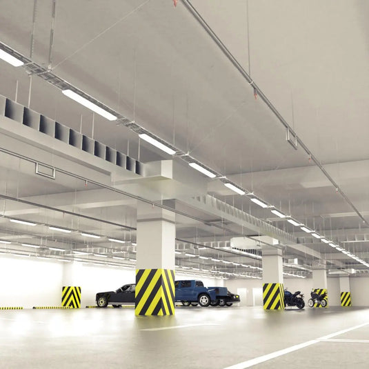 NCF IP65 LED Batten with Microwave Sensor in natural white light inside parking lot setting