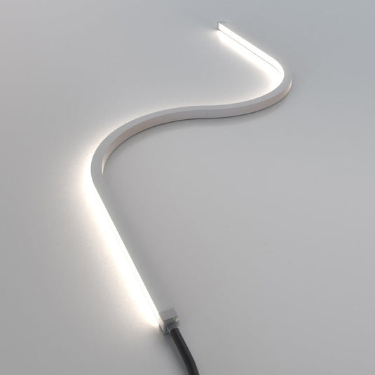 Natural white neon flex in an S curve