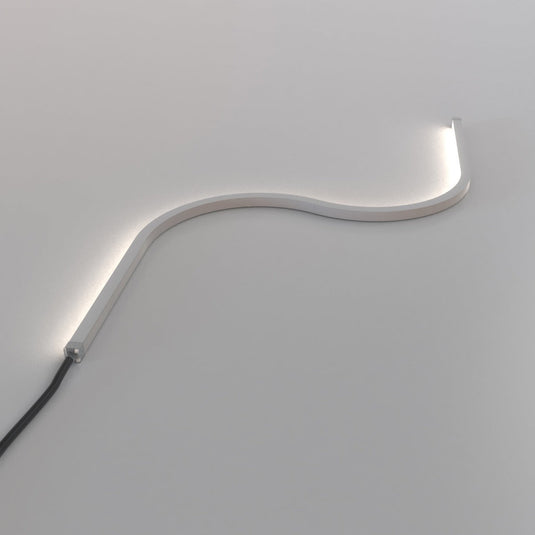 Side view of natural white neon flex in an S curve