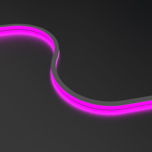 RGB neon flex glowing pink in an S curve