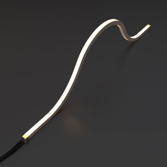 Top bending warm white neon flex arched, from behind